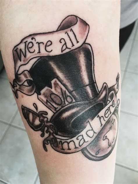 alice in wonderland tattoos|mad hatter hat tattoo designs.